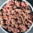 Load image into Gallery viewer, A bowl of Beef Complete Mix raw meat dog food from Raw K9