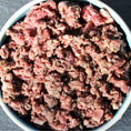 Load image into Gallery viewer, A bowl of Beef Complete Mix raw meat dog food from Raw K9
